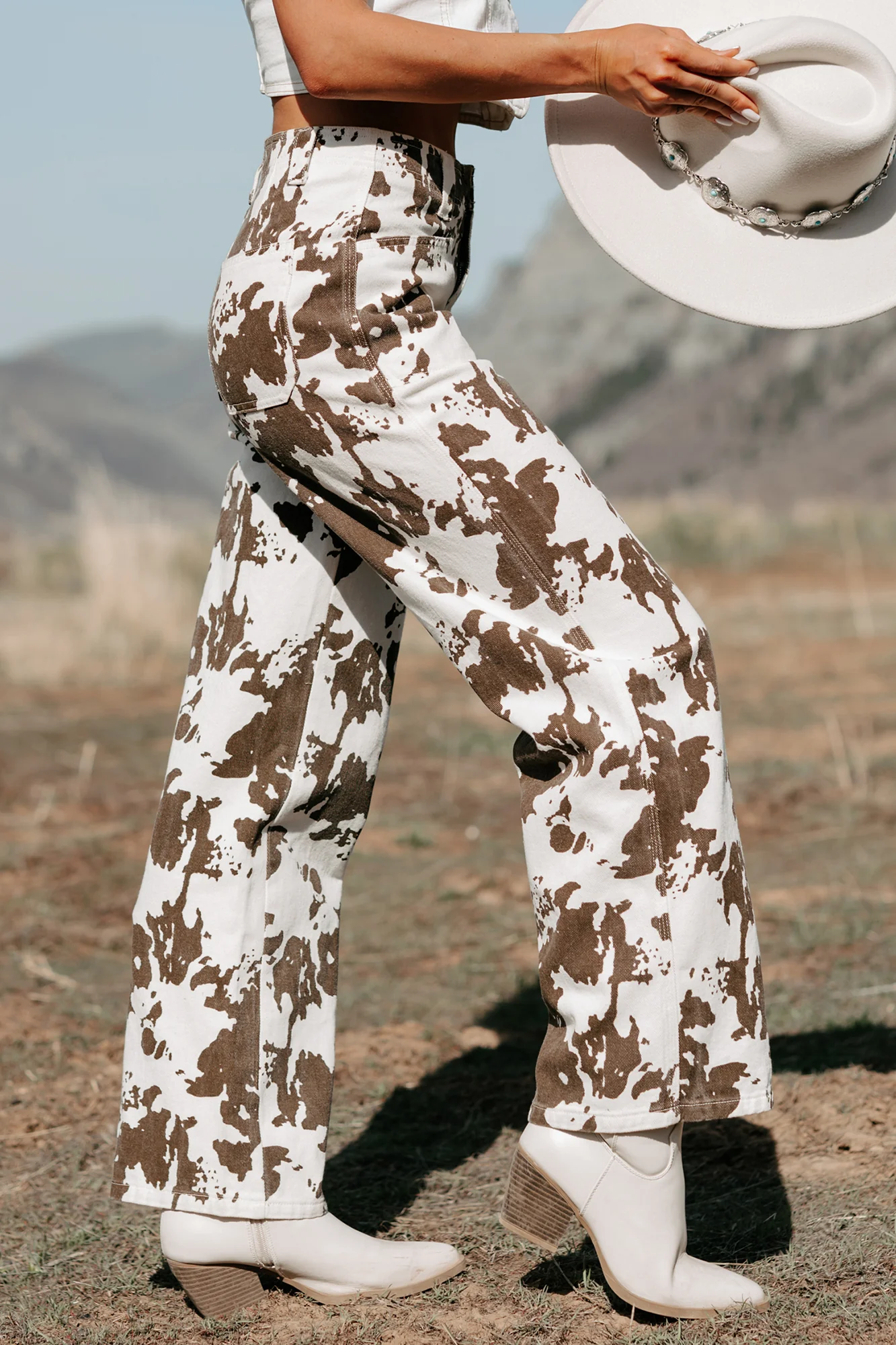 Cowboy Up Cow Print Pants (White/Brown) - Image 3